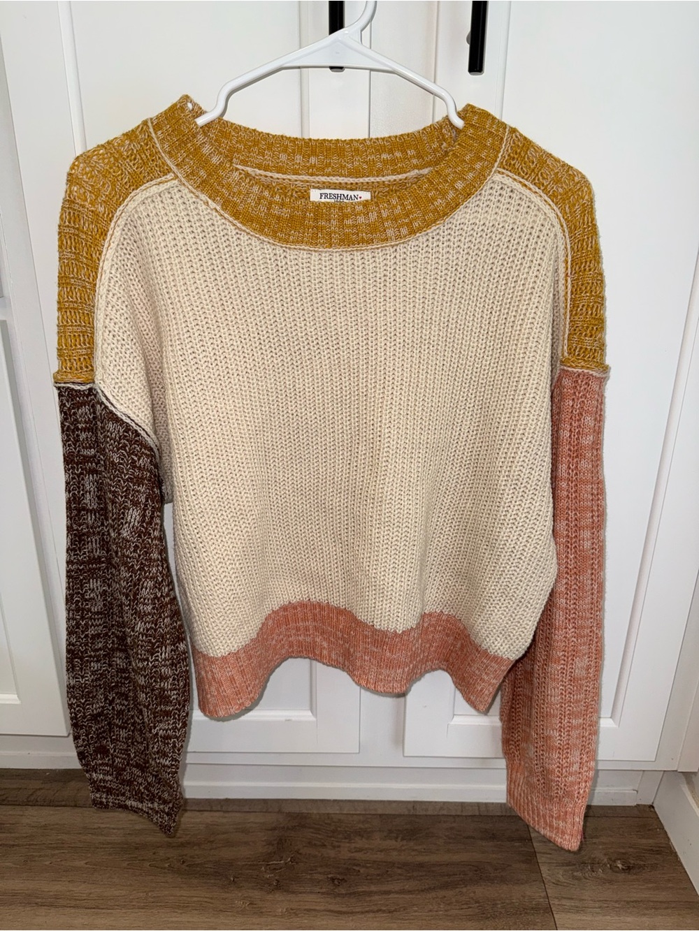 Freshman multi-colored knit sweater with color-blocked sections